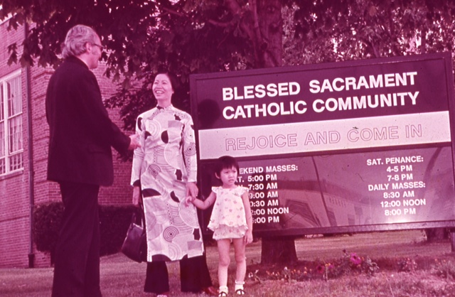 Mom, Thoong and Father in front of Blessed Sacrament Church  Photograph Courtesy of Thuy Dinh